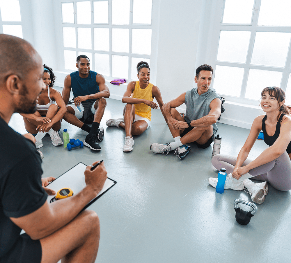People resting after workout indoors